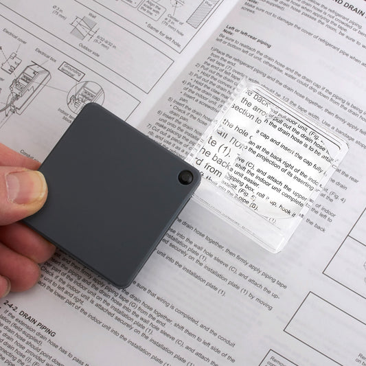 Carson MagniFlip Plus GN-44 – Taschenlupe 2,5× / 5× / 7× mit Schutzhülle (Schwarz)