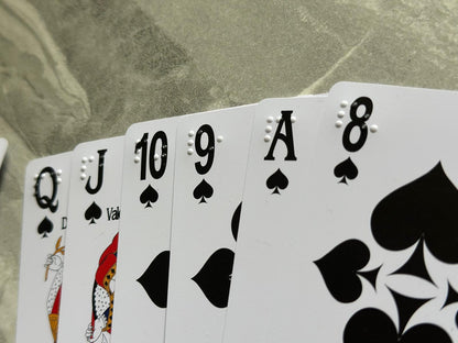 Romme mit Brailleschrift und Großdruck